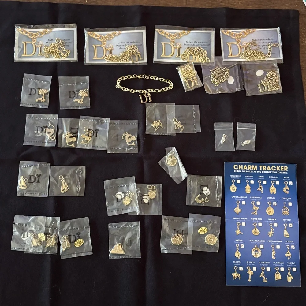 Diamond International Gold Charm Bracelet Set. 8 bracelets multiple charms. - Picture 1 of 15